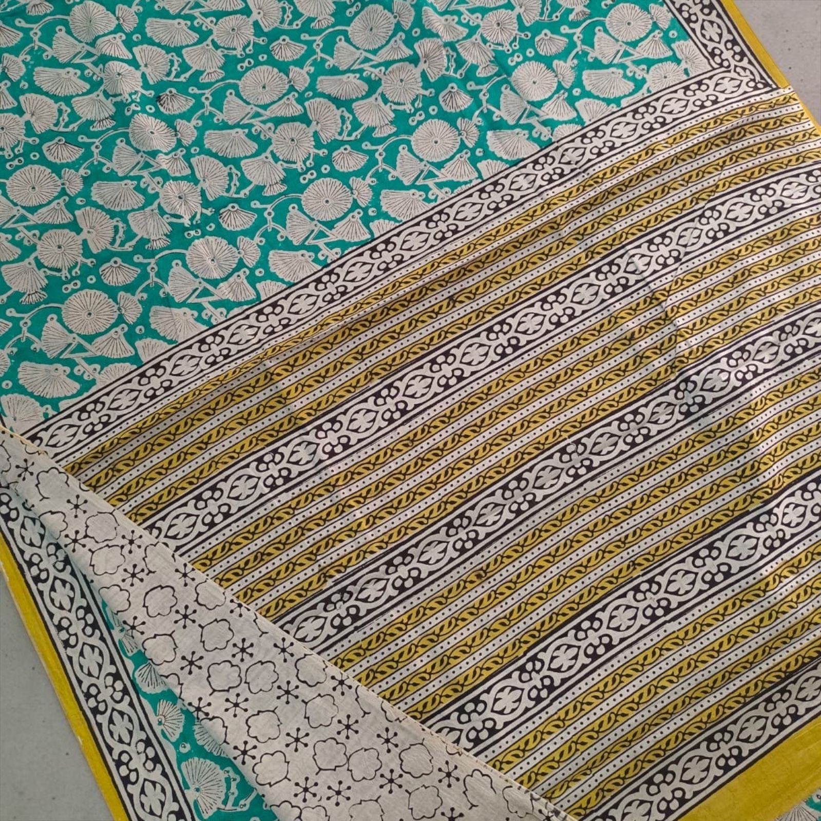 🌿 Teal Green Printed Cotton Saree with Yellow Border
